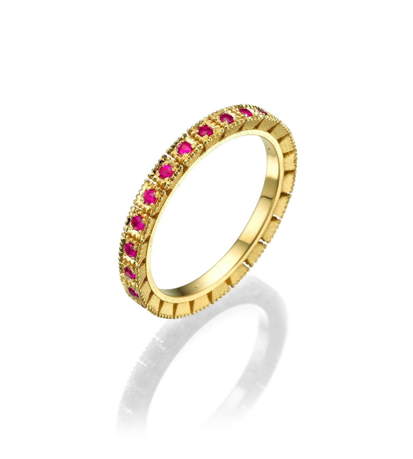 A gold ring set with a ruby